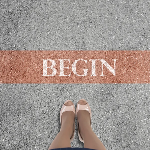 Businesswoman feet standing at line