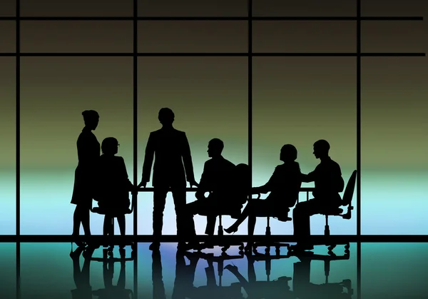 Businessteam sitting round table