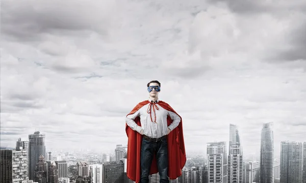Super hero businessman in mask