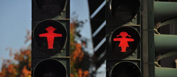 Red female and male Ampelmann, Eastern German traffic lights