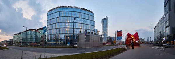 Warsaw, Poland - March 28, 2016: Kasprzaka street, Office building Warsaw Spire under construction, panoramic view