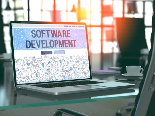 Software Development on Laptop in Modern Workplace Background.