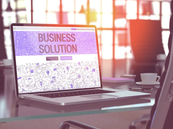 Business Solution on Laptop in Modern Workplace Background.