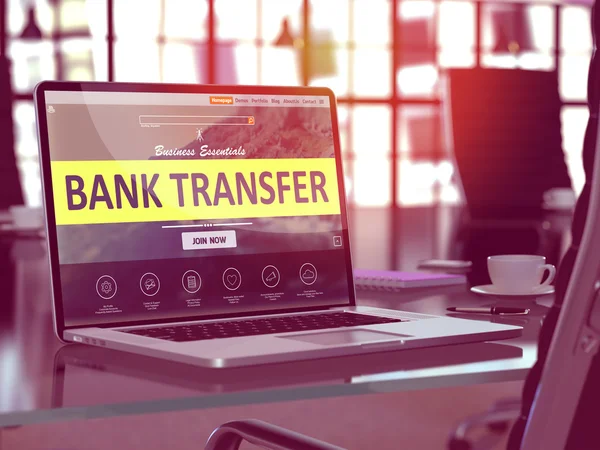 Bank Transfer on Laptop in Modern Workplace Background.