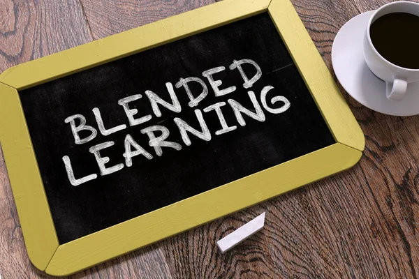 Blended Learning Handwritten by White Chalk on a Blackboard.