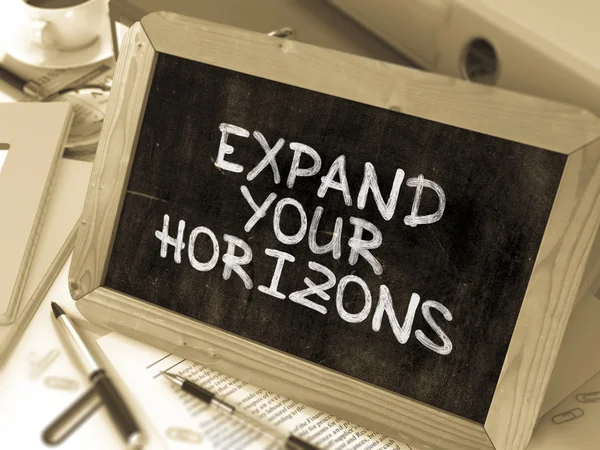 Expand Your Horizons. Motivation Quote a Blackboard.