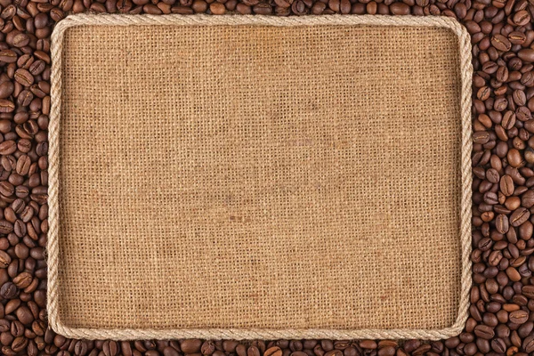 Frame made of rope with coffee beans on sackcloth