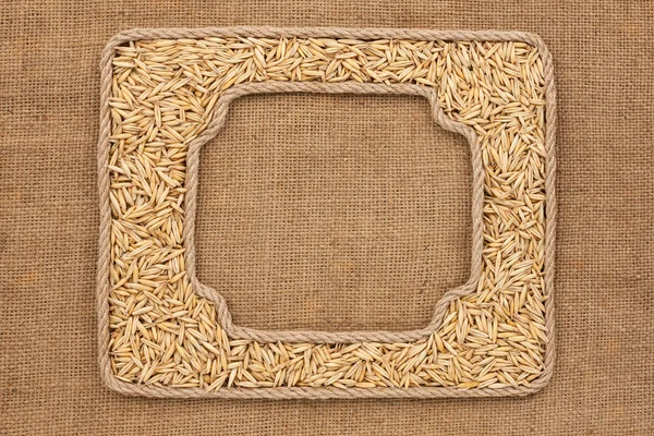 Two frames made of rope with oats grains on sackcloth