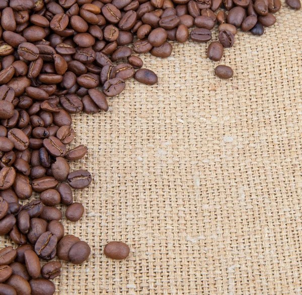 Coffee beans corner on burlap