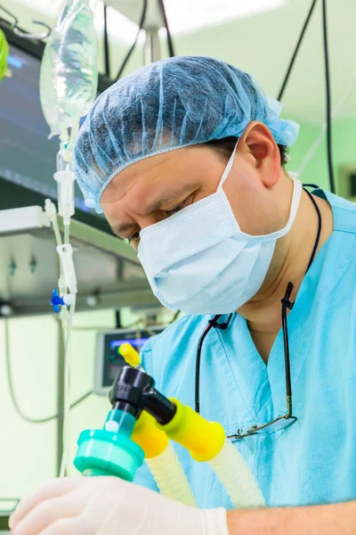 Anesthesiologist in operation room