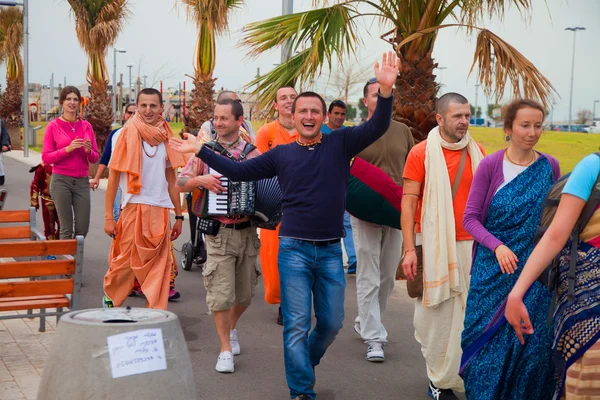 People dressed as Krishnaists at Purim celebrations