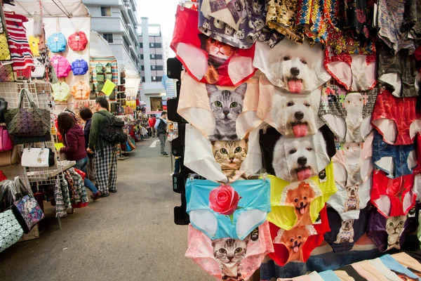 Street market with large selection of underwear with funny pictures of cats and dogs