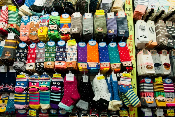 Design colorful socks set in big store with large selection of funny children wear