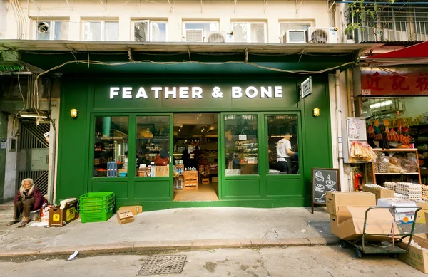 Urban scene with stores and rustic buildings of city at sunny day in Hong Kong