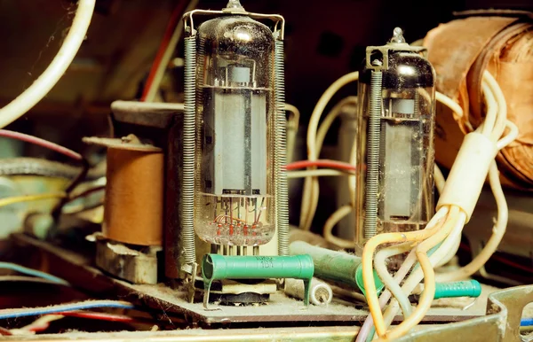 Details of an old tube amp inside the radio or turntable