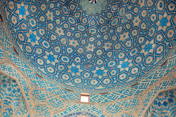 Patterns of ceramic tile of the blue ceiling of the historic mosque in Iran
