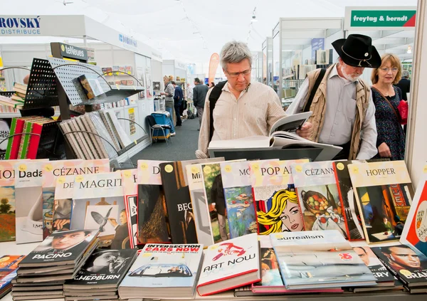 Many people choose art and photo books at the indoor book market