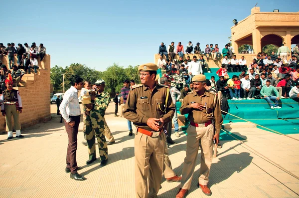 Group of police men keep order on the popular indian events