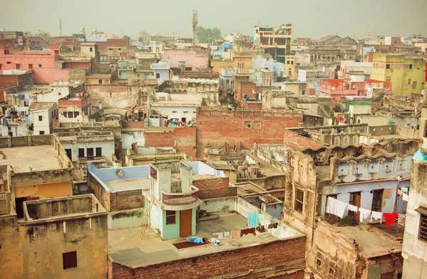 Cityscape of historical indian city with brick buildings in bad condition