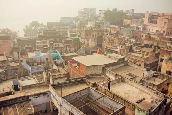 Fog over historical indian city with brick buildings with grunge walls