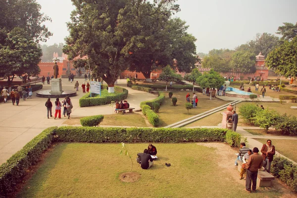 Students meeting in yard of famous Bannares Hindu University with green area