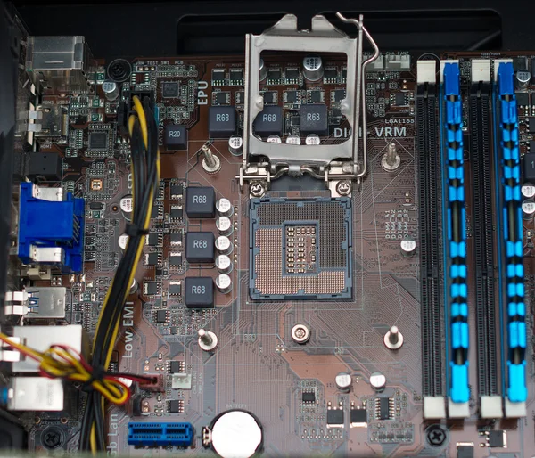 Inside of pc. Motherboard, CPU socket and RAM memory.