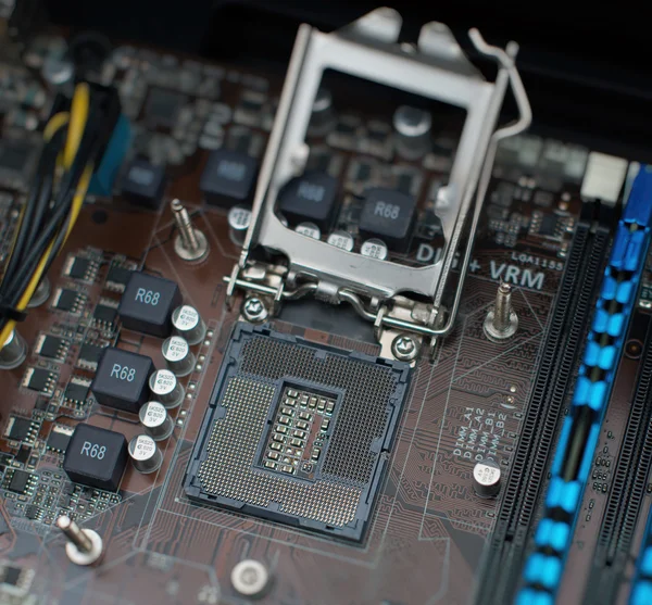 Inside of pc. Motherboard, CPU socket and RAM memory.