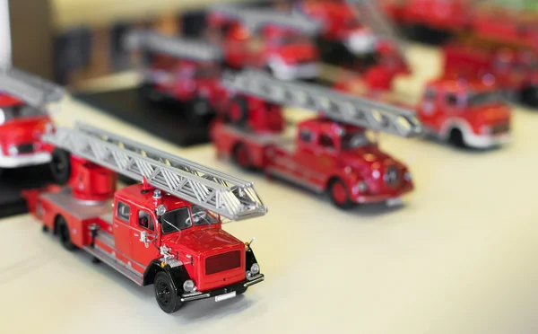 Miniature fire engine car models in the shop.