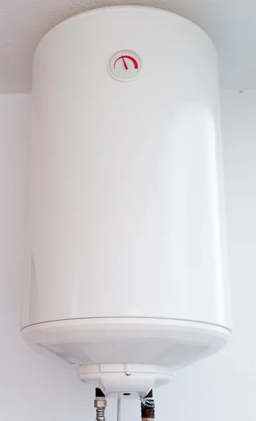 Modern electric water boiler on the wall.