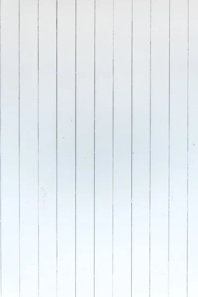 Close-up view of wooden white wall.