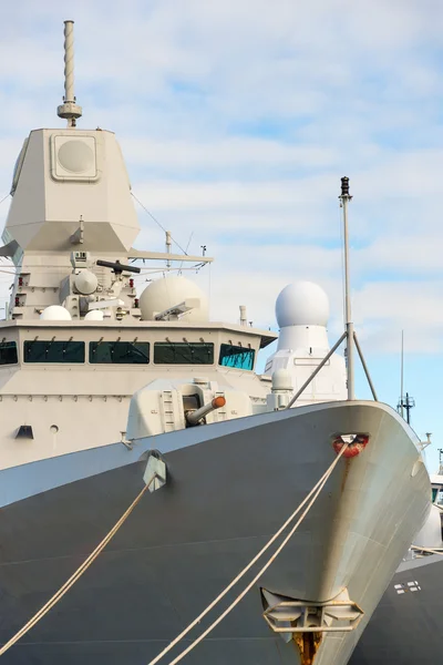 Close-up view of naval ship with gun.