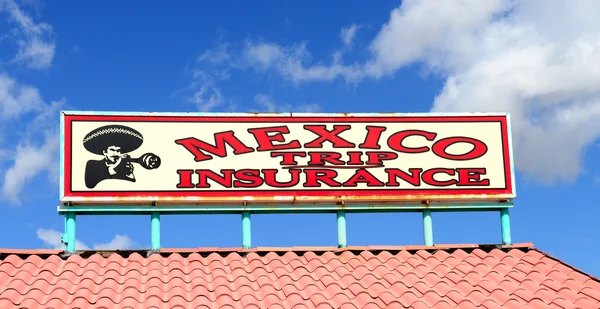 Sign selling trip insurance for going into Mexico