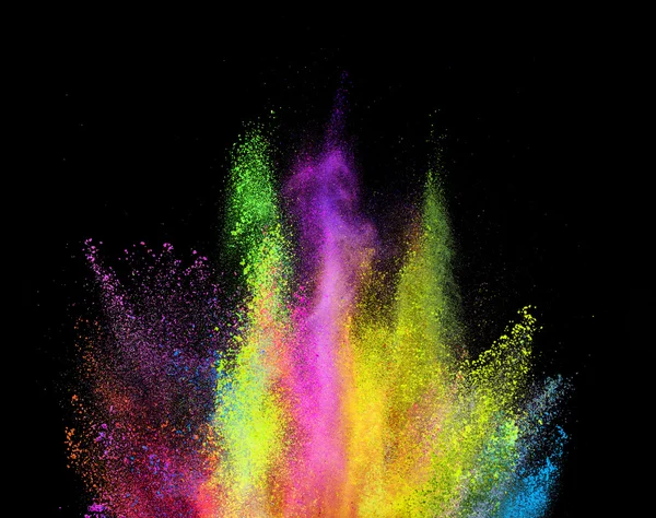 Explosion of colored powder on black background