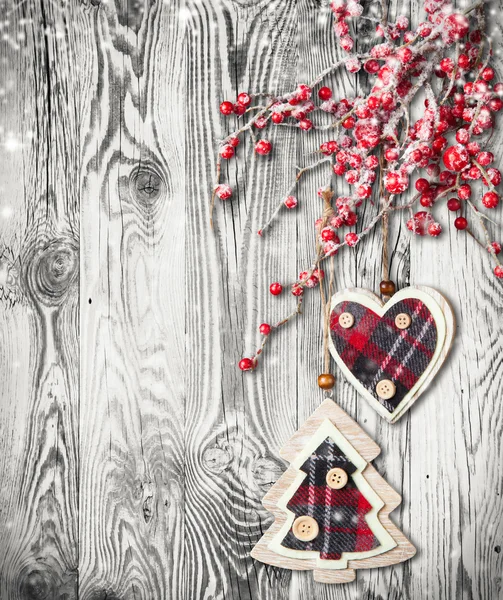 Hand made traditional christmas decoration on wood