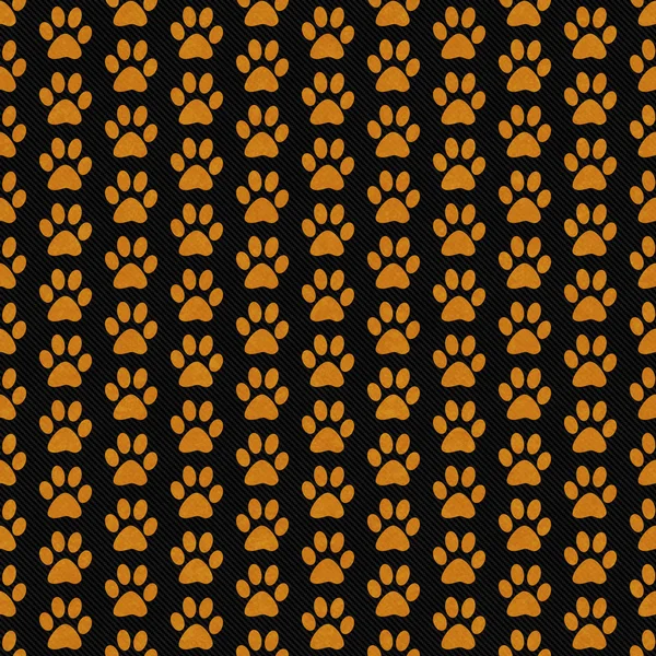 Orange and Black Dog Paw Prints Tile Pattern Repeat Background