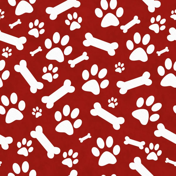 Red and White Dog Paw Prints and Bones Tile Pattern Repeat Backg