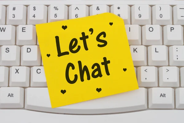 Let's Chat, computer keyboard and sticky note