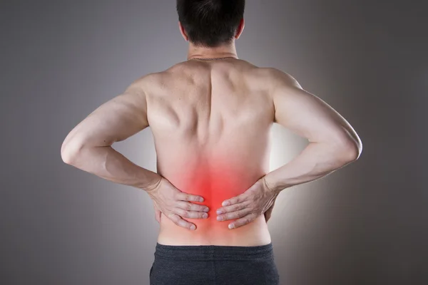 Kidney pain. Man with backache. Pain in the man's body