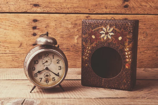 Antique clock with carved wooden box