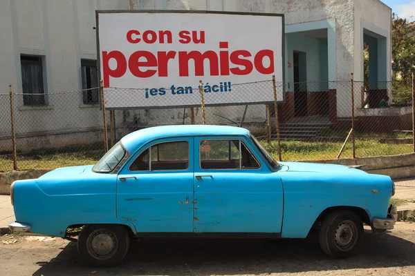 Vintage car parked in the street of old havana, cuba