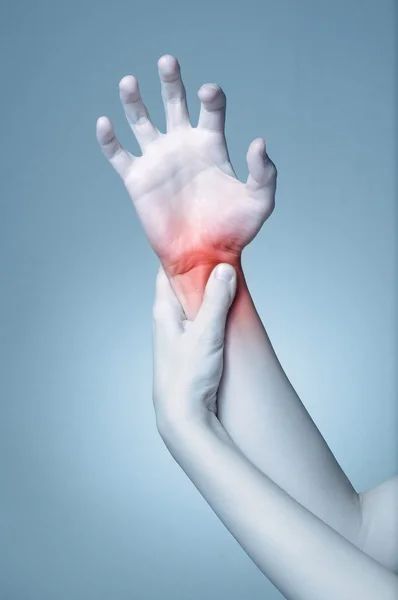 Woman\'s hand with wrist pain