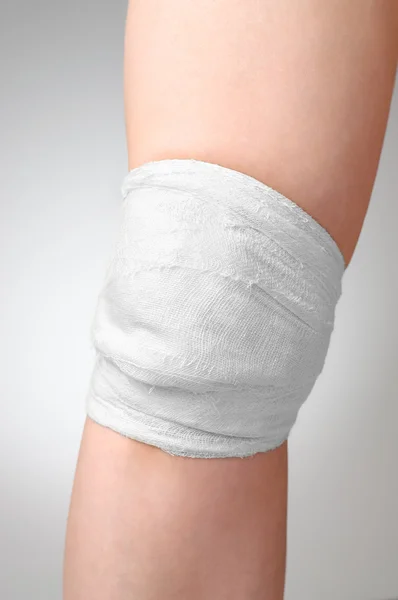 Injured knee with bandage