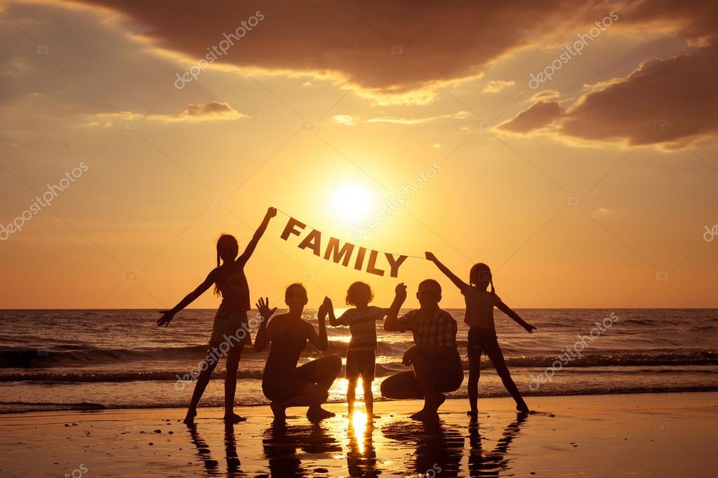 depositphotos_66923637 stock photo happy family standing on the