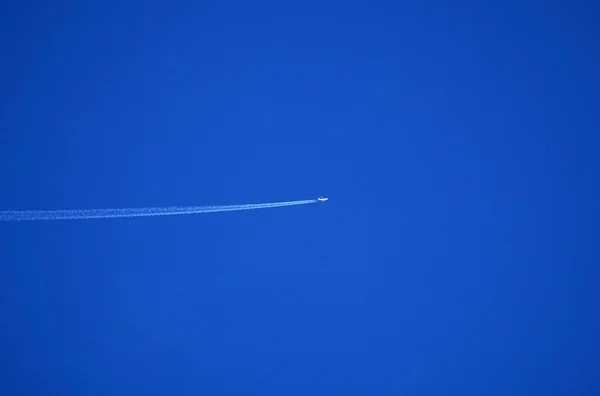 Plane in the blue sky