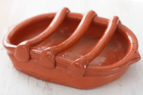 Traditional portuguese ceramic dish for smoked sausage