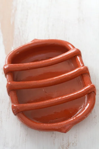 Traditional portuguese ceramic dish for smoked sausage