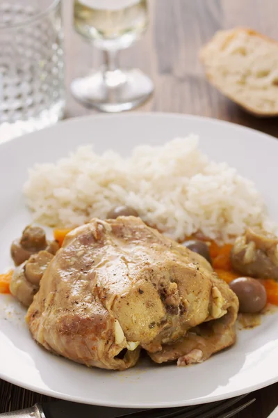 Rabbit stew with mushrooms, carrot and boiled rice