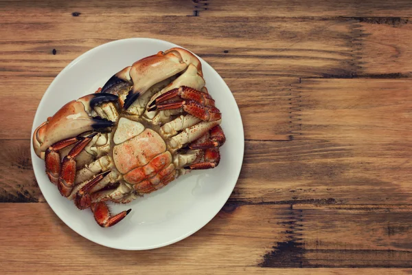 Boiled crab on white plate