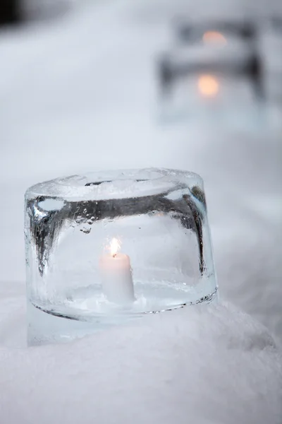 Ice lanterns with white candles