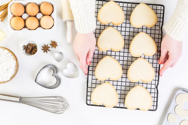 Baking heart shaped sugar cookies